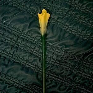 Elegant Yellow and Green Glass Flower